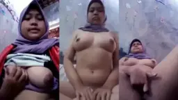 ABG Jilbab Pamer Susu Montok Colmek Video by PornOne